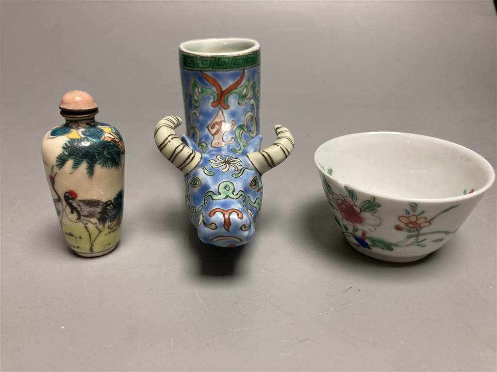 A Chinese famille rose cup, an ox rhyton cup and an enamel on copper snuff bottle